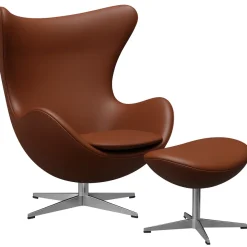 Fritz Hansen Ægget, Cognac Aura læder, med returdrej inkl. skammel af Arne Jacobsen> Lænestole